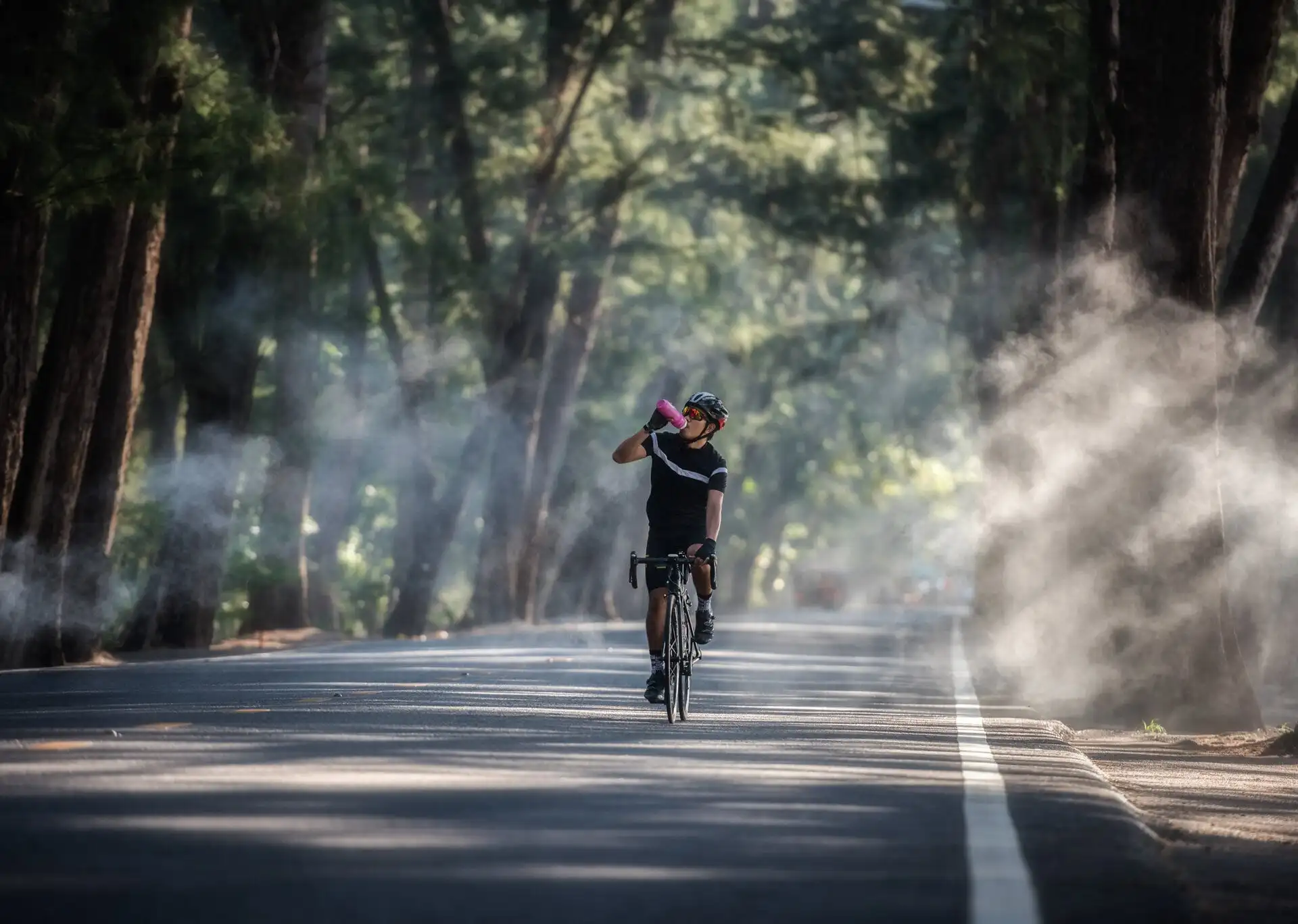 cyclist drinking water cyclist drinking water