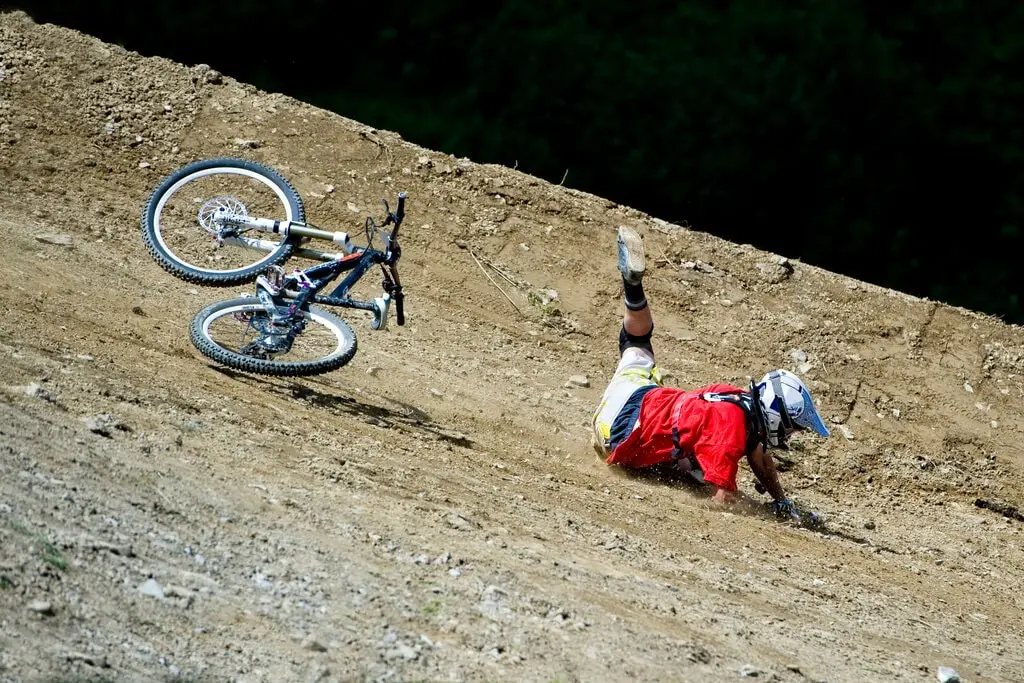 mountain biker crashed and sliding mountain biker crashed and sliding