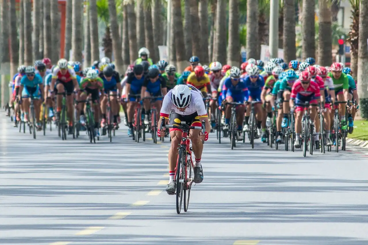cyclist sprinting off the front of a race peloton cyclist sprinting off the front of a race peloton