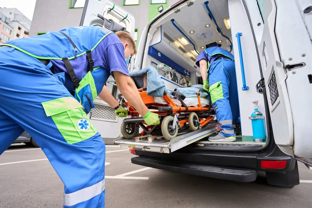 injured person in an ambulance injured person in an ambulance