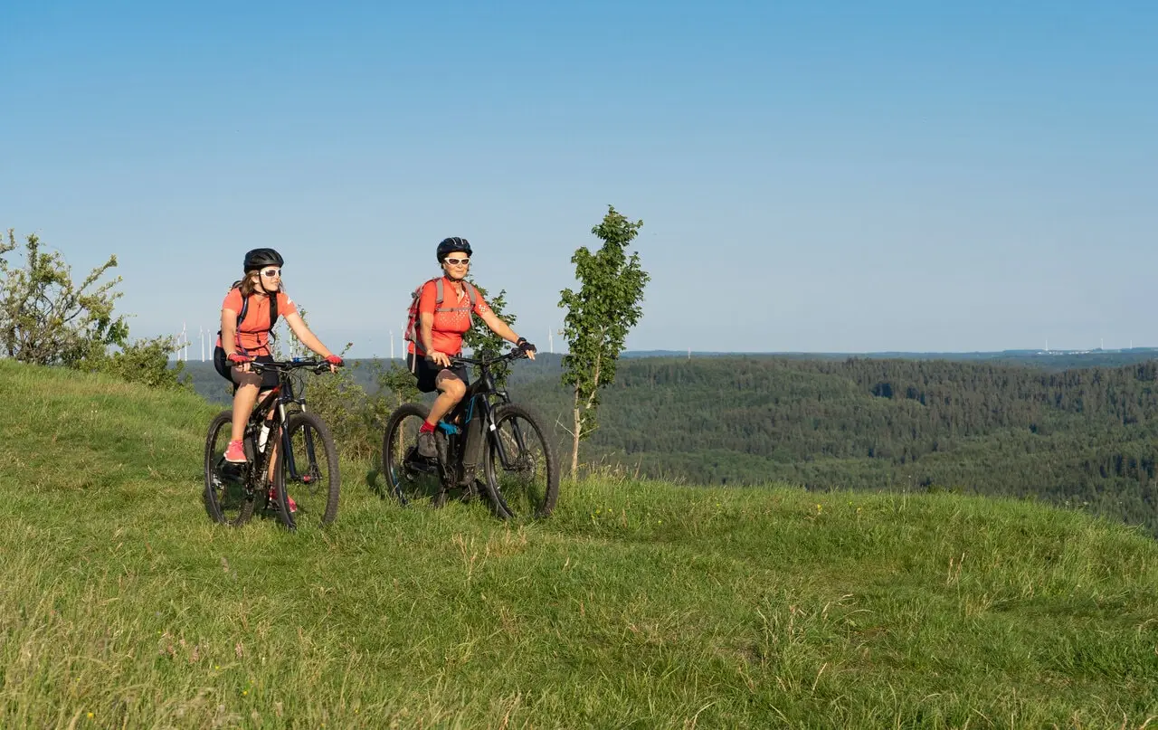 mother and daughter on ebikes mother and daughter on ebikes