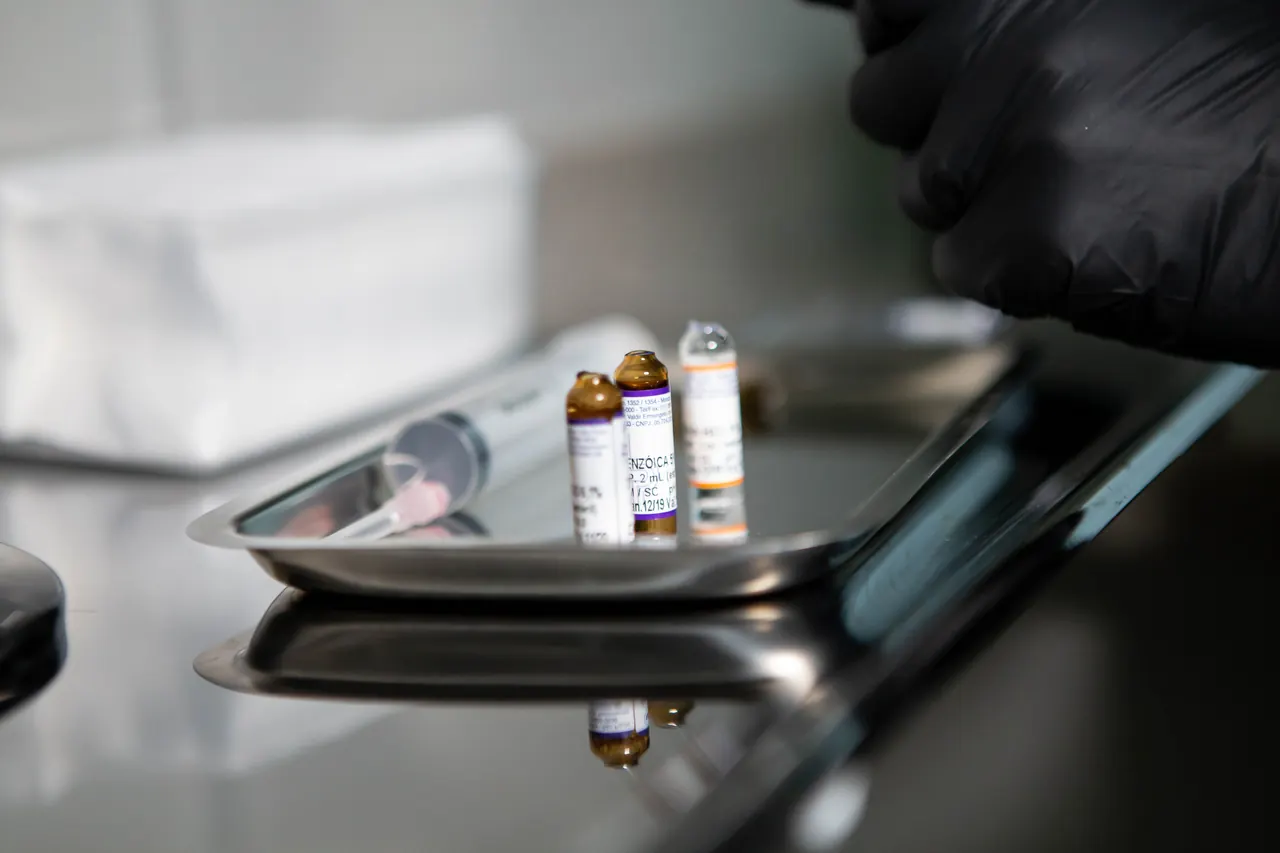 Research-use-only vials come with no sterility guarantee and no manufacturer to answer for them Gloved hands with a syringe and opened glass ampoules on a stainless steel tray