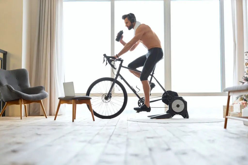 cyclist on an indoor trainer cyclist on an indoor trainer