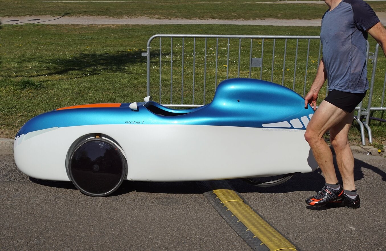 man and velomobile