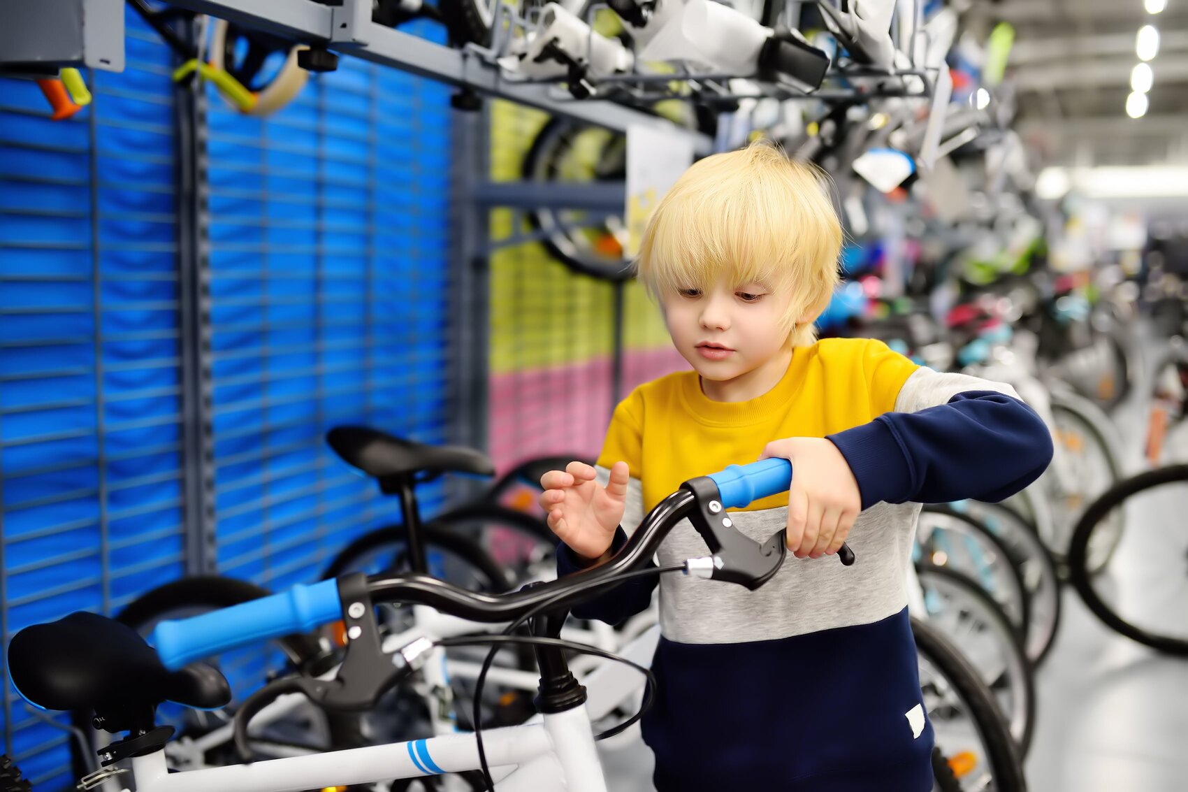 child in bike store
